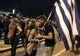 A couple kisses during an Indignant antiausterity rally at Syntagma square in Athens, May 2011 (Reuters)
