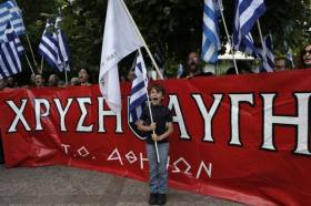 A boy shout slogans with supporters of the neonazi Golden Dawn party during a rally commemorating the Fall of Constantinople in 1453, in Athens, 29 May 2014 (Photo: Reuters)